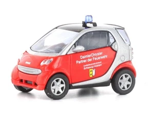 Busch 489315 Smart City Coupe Vigile Del Fuoco Schleswig Holstein HO 1:87 NUOVO - Foto 1 di 1