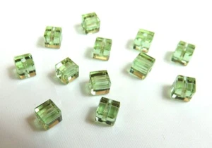 12 Pieces ~ CANTALOUPE GREEN ~ 4mm CUBES ~ SWAROVSKI CRYSTAL BEADS LOT - Picture 1 of 1