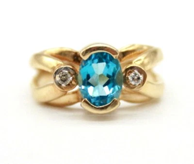 Anillo de compromiso vintage de oro amarillo de 10K corte ovalado topacio azul y diamantes.Talla 6 Foto 1 de 4