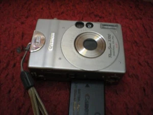 Canon PowerShot S100 Digital ELPH 2.1MP AiAF 3x Digital Camera - Silver - Picture 1 of 13