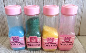 Lote de 4 frascos de plástico vintage con tapa rosa decoraciones pastel mate azul rosa amarillo verde - Imagen 1 de 4