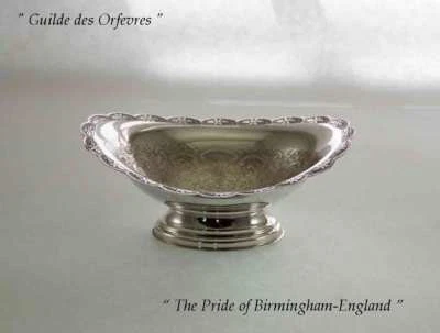 Plato dulce plateado ovalado, en relieve Foto 1 de 4