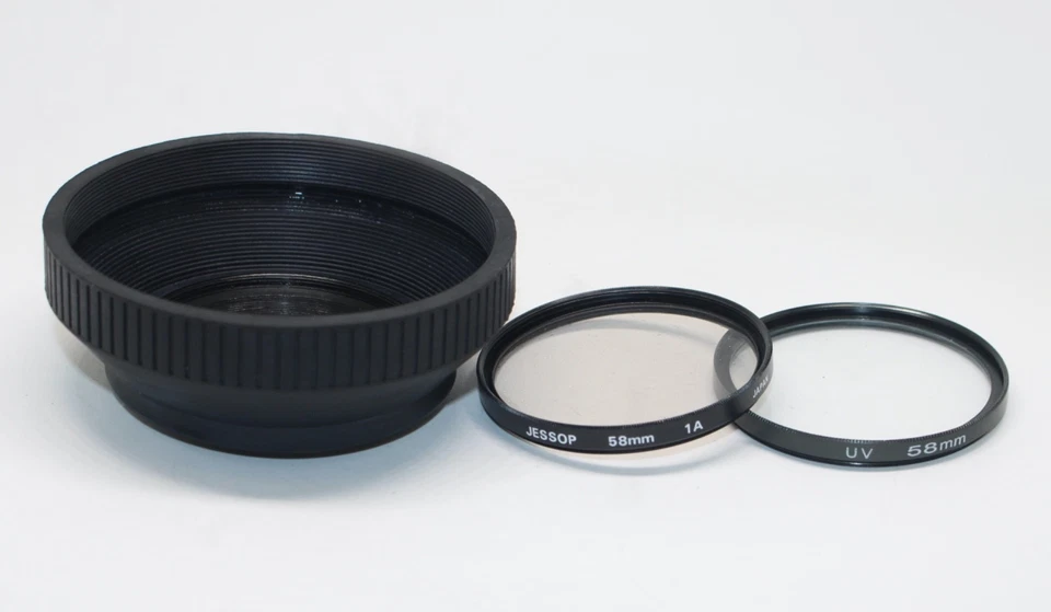Vintage 58mm Camera Lens Filters: Skylight 1A, UV and rubber lens hood - Image 1 of 2