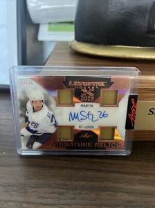 Martin St. Louis AUTOGRAPHED/ GAME USED Signature Relics. NUMBERED 23/25.
