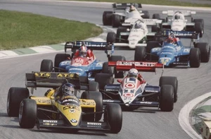 Gerhard Berger ATS D7 BMW leads Francois Hesnault Ligier JS23 Rena- Old Photo - Bild 1 von 1