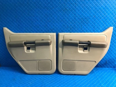 2003 Explorer Sport Trac 左后右门内部装饰面板米色一对 — 第 1/4 张图片