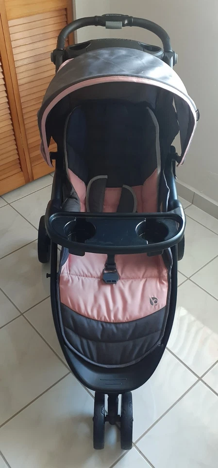 Carrinho de Viagem Baby Trend EZ Ride System Rosa e Cinza com Elevador EZ - Imagem 1 de 4