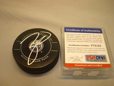 Taylor Hall Signed Edmonton Oilers Official Game Hockey Puck PSA/DNA COA 1A - Image 1 of 3