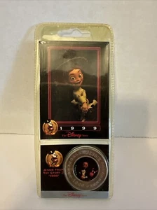 Disney Decades Coins #10 1999 Jessie Toy Story 2 New Yellowed Plastic - Picture 1 of 7