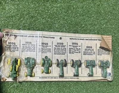 John Deere The Evolution Of John Deere Tractors 7piece tractor set #560 1/64 - Image 1 of 4