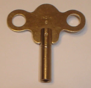 Vintage #6 Steel Gingerbread Kitchen, Parlor, Wall, Mantel Clock Key India A38 - Imagen 1 de 3