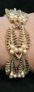 BRACCIALE CORO anni 60 osso di pesce marrone finta perla placca oro 7" firmato - Foto 1 di 3