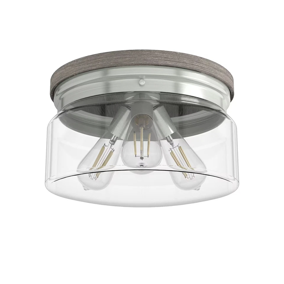 Brushed Nickel Three Light Flush Mount from the Devon Park Collection - Image 1 of 1