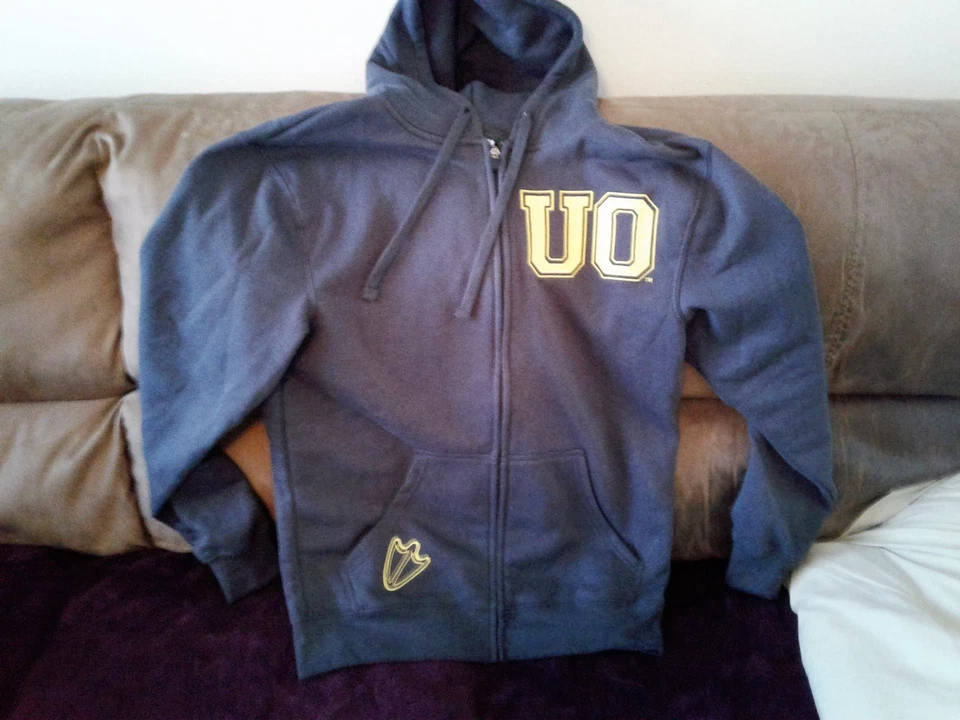 NCAA OREGON PATOS SUDADERA CON CAPUCHA TALLA L PARA HOMBRE SUDADERA CON CAPUCHA CON BOLSILLOS GRIS CREMALLERA LG OR.DUCKS UO  Foto 1 de 4