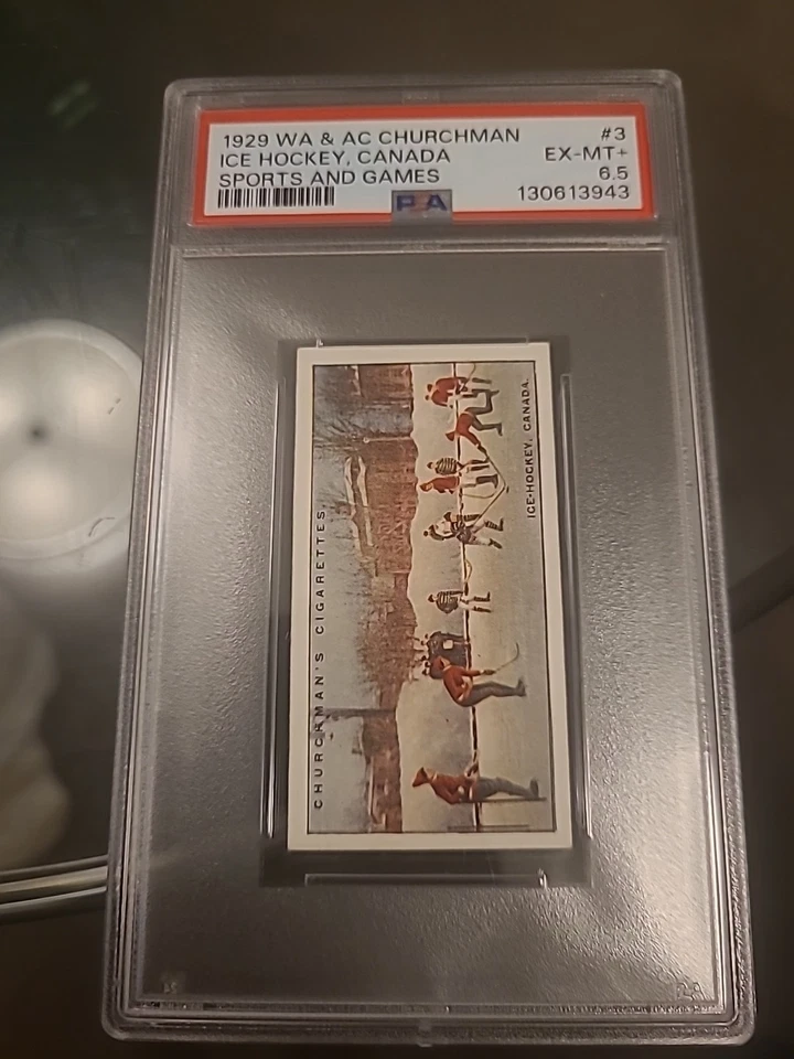 CHURCHMAN-SPORTS & GAMES IN MANY LANDS 1929-#03- ICE HOCKEY - CANADA PSA 6.5 - Image 1 of 2