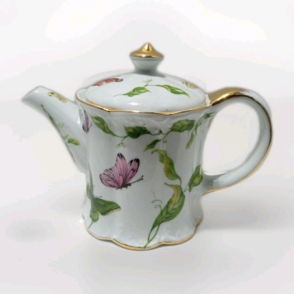 Tetera de porcelana Godinger mariposas y enredaderas borde dorado 6,75" Foto 1 de 4