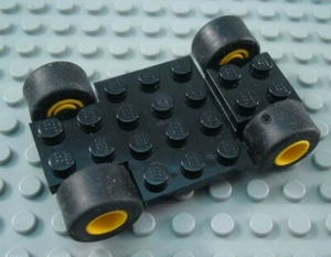 LEGO Black 7x4x2/3 Car Vehicle Base with Yellow Hubs - Picture 1 of 1