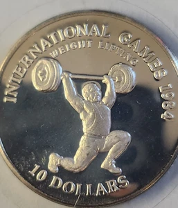1984 Republik Liberia 10 $ Gewichtheben Internationale Spiele PP Münze - Bild 1 von 4