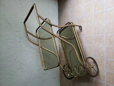 Carro de barra rodante vintage e histórico  Foto 1 de 4