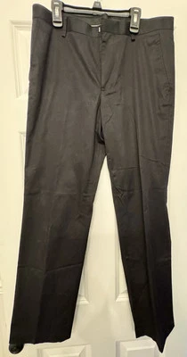 Calça social INC International Concepts masculina slim fit frente plana preta 30x32 - Imagem 1 de 4