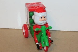 VERY NICE PULL WIND SANTA CLAUS TRICYCLE CANDY CONTAINER with PRODUCT - Picture 1 of 9