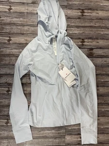 Lululemon Mist Over Windbreaker Jacke Farbe STRH hellblau Größe 8 128 $ - Bild 1 von 2