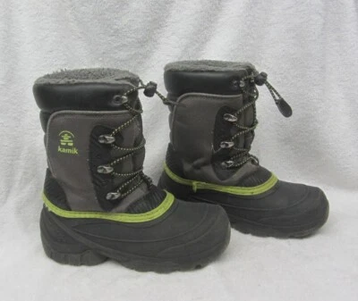 Botas impermeables para lluvia y nieve para niños grandes talla 1 negras aisladas Foto 1 de 4