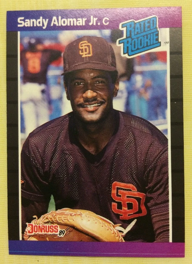 1989 Donruss Sandy Alomar младший дебютант (RC) #28 синий принт кровотечение, сломанная черная линия - Изображение 1 из 2