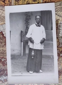 RARE RPPC OF AN AFRICAN PRIEST HOLDING INCENSE BURNER CIRCA 1920 WHITE VESTMENTS - Picture 1 of 5