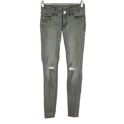 Jeans ajustados Old Navy Rockstar para mujer desgastados tiro bajo talla 0 gris elástico Foto 1 de 4
