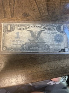 1899 Black Eagle Silver Dollar  - Picture 1 of 2
