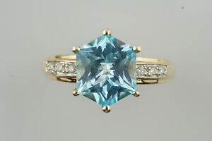 Sensational 9ct hexagon Blue topaz & diamond ring. Unusual