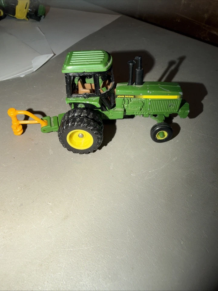 Ertl John Deere 5571 Toy Farm Tractor 1/64 Scale Diecast With Post Hole Auger - Image 1 of 3