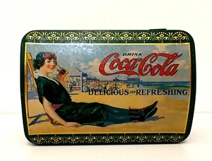 Drink Coca Cola Delicious Refreshing Lady on Beach Metal EMPTY Tin (has a hole) - Picture 1 of 9