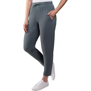 Pantalones activos Kirkland Signature cómodos de 4 vías elásticos para dama (azul, L) - Imagen 1 de 4