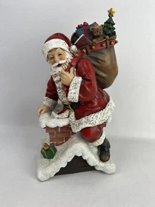 Napco Weihnachtsmann Klettern den Schornstein hinunter mit Geschenken Harz Steinzeug - Bild 1 von 9