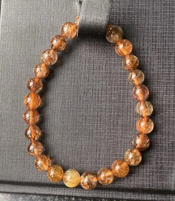 7.2mm Natural Copper Brown Rutilated Crystal Super Energetic Bracelet - Image 1 of 3