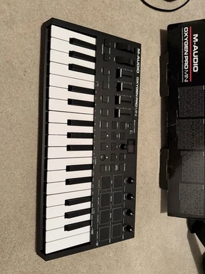 M-Audio Oxygen Pro Mini – 32 Key USB MIDI Keyboard Controller With Beat Pads, - Image 1 of 4