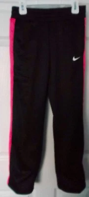 PANTALONES DE ENTRENAMIENTO NIKE THERMA-FIT NEGROS Y ROSAS PARA NIÑAS - TALLA MEDIANA - NUEVOS CON ETIQUETAS Foto 1 de 4