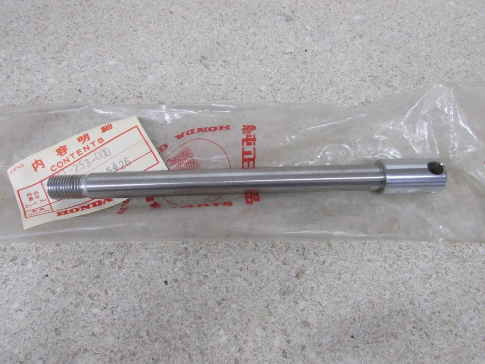 NOS HONDA CA72 CA77 DREAM TOURING 250 305 OEM FRONT WHEEL AXLE 44301-253-000 - Image 1 of 1
