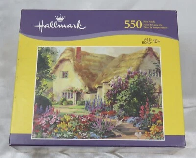 Hallmark Thatched Roof House & Garden 550-piece Jigsaw Puzzle - Image 1 of 4