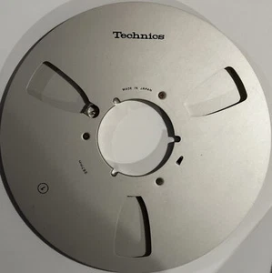 Technics Original-Zubehör-Hersteller 10,5" leere Metallspule für 1/4" Band, 3 Fenster silber, mit Box & Tasche - Bild 1 von 1