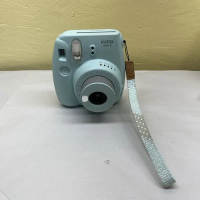 Cámara fotográfica instantánea Fujifilm Instax Mini 9 - azul hielo - probada sin cubierta de batería Foto 1 de 4