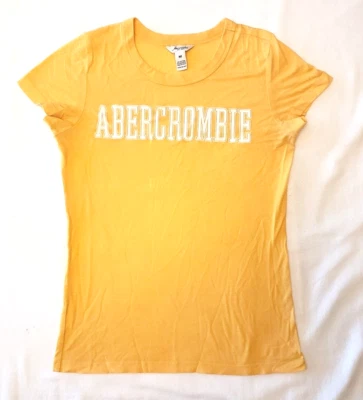 Girl's - Abercrombie & Fitch "ABERCROMBIE" Yellow Vintage T-shirt. Size Medium. - Image 1 of 2