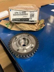 MAZDA Genuine OEM ACTR,VARIABLE V. TIMING LF94-12-4X0D - Picture 1 of 3