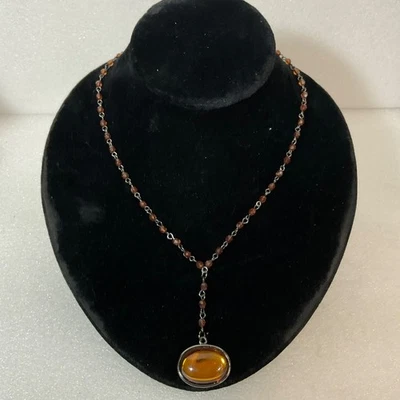 Collar Colgante Claire’s 18 pulgadas Cadena de Cuentas de Vidrio Ámbar Tono Gunmetal Joyería Foto 1 de 4