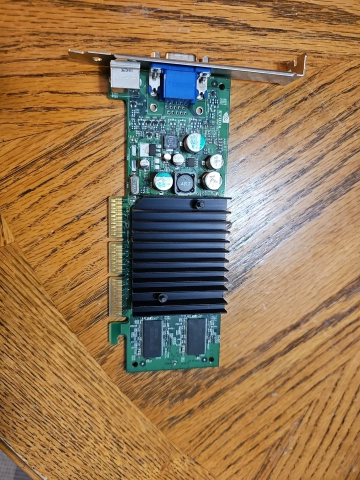 180-10073-0000-A03 NVIDIA 64MB AGP VIDEO CARD WITH VGA AND TV-OUT SVIDEO OUTPUTS - Image 1 of 4