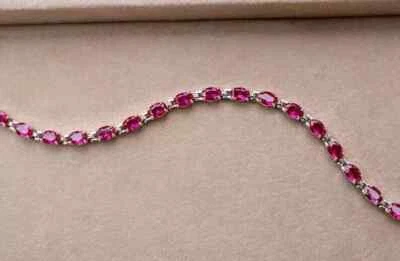 Brazalete de tenis para mujer 6,00 quilates corte ovalado simulado rojo rubí enchapado en oro blanco de 14 quilates Foto 1 de 4