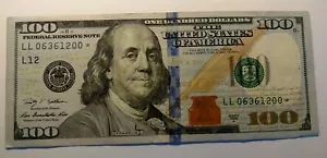 2009 $100.00 Federal Reserve Star Note. Star note, Serial Number L L 06361200* - Picture 1 of 9
