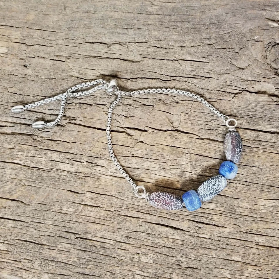 Pulsera ajustable única con cuentas azules y grises y acero inoxidable Foto 1 de 1